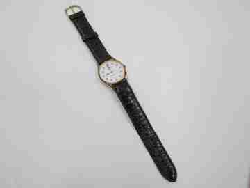 Cauny Elegance ladie's wristwatch. Quartz. Gold plated & steel. Strap. 1980's