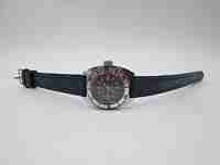 Cauny ladie's dive watch. Steel & chromed metal. Manual wind. Blue dial. 1960's