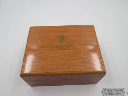 Cauny Prima Calendar. Steel & gold plated. 1960's. Wood box. Date