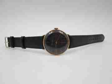 Cauny Prima De Luxe. Chapado oro 10 micras y acero. Cuerda manual. Dial negro. 1970