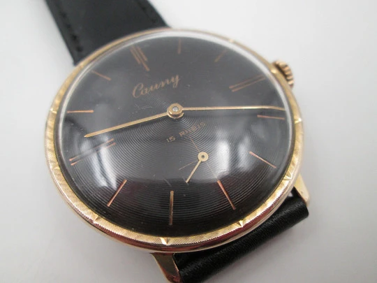 Cauny Prima De Luxe. Chapado oro 10 micras y acero. Cuerda manual. Dial negro. 1970