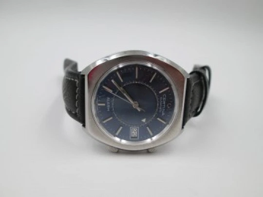 Certina alarm wristwatch. Steel. Automatic. 1970's. Date. Square case