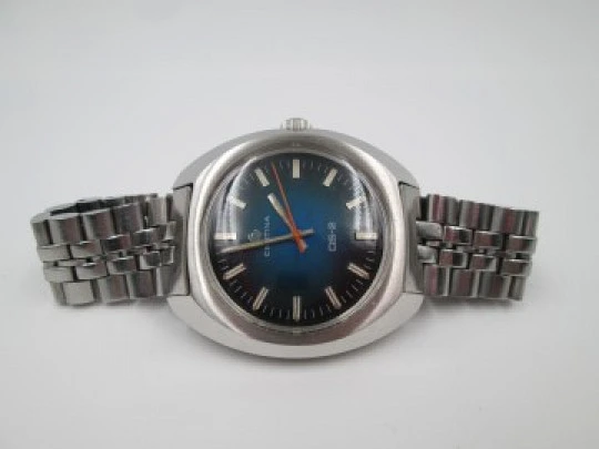 Certina DS-2. Acero inoxidable. Cuerda manual. Brazalete y correa. Dial azul. 1970