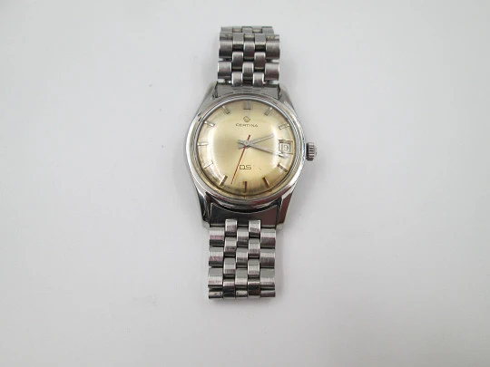 Certina DS Turtle. Stainless steel. Manual wind. Calendar. Bracelet. Golden dial. 1960's