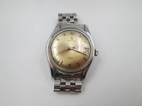Certina DS Turtle. Stainless steel. Manual wind. Calendar. Bracelet. Golden dial. 1960's
