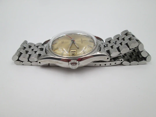 Certina DS Turtle. Stainless steel. Manual wind. Calendar. Bracelet. Golden dial. 1960's