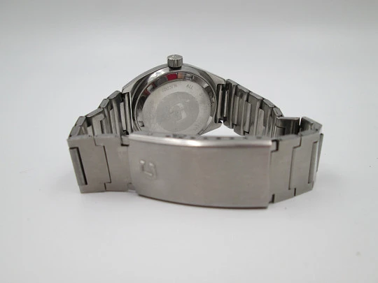 Certina. Acero inoxidable. Esfera negra. Cuerda manual. Calendario. Brazalete. 1970