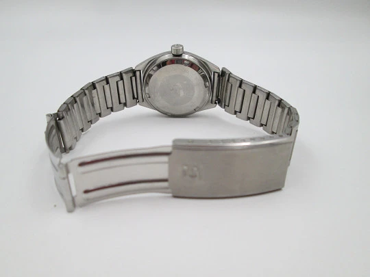 Certina. Acero inoxidable. Esfera negra. Cuerda manual. Calendario. Brazalete. 1970