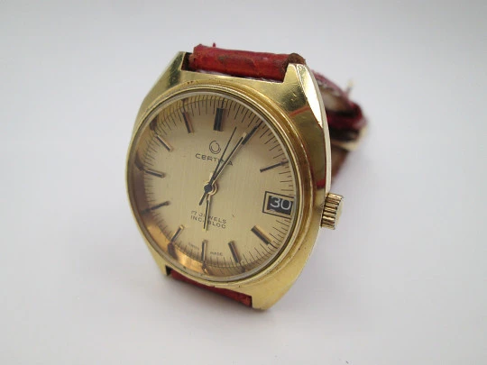 Certina. Gold plated and stainless steel. Manual wind. Calendar. 1960's. Swiss