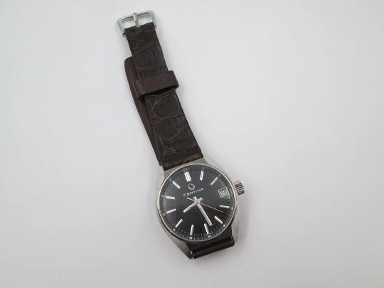 Certina. Stainless steel. Automatic. Calendar. Black dial. Strap. Swiss. 1970's