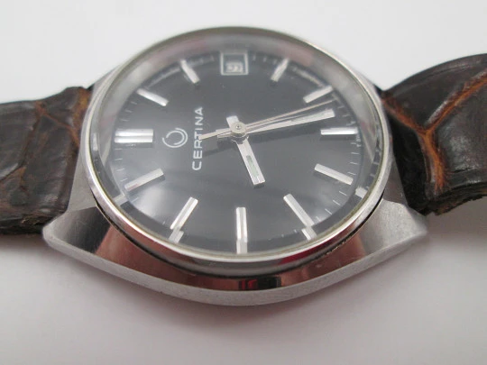 Certina. Stainless steel. Automatic. Calendar. Black dial. Strap. Swiss. 1970's