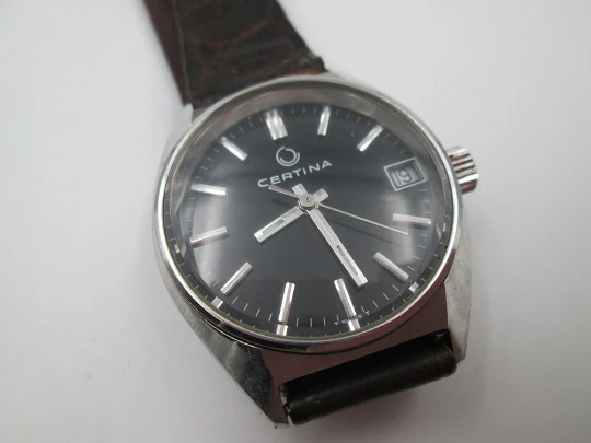 Certina. Stainless steel. Automatic. Calendar. Black dial. Strap. Swiss. 1970's