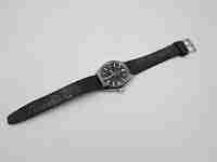 Certina. Stainless steel. Automatic. Calendar. Black dial. Strap. Swiss. 1970's