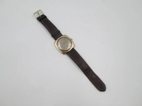 Certina. Steel & gold plated. Square case. Manual wind. Grey dial Strap. 1960's