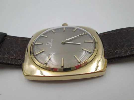 Certina. Steel & gold plated. Square case. Manual wind. Grey dial Strap. 1960's