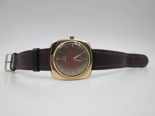 Certina. Steel & gold plated. Square case. Manual wind. Grey dial Strap. 1960's