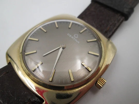 Certina. Steel & gold plated. Square case. Manual wind. Grey dial Strap. 1960's