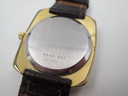 Certina. Steel & gold plated. Square case. Manual wind. Grey dial Strap. 1960's