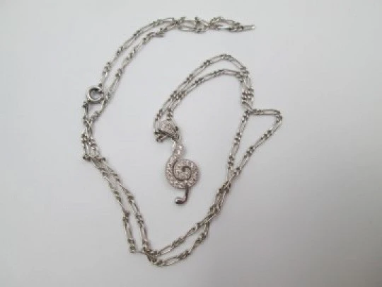 Chain with musical note pendant. 925 sterling silver and white gems. 1990's