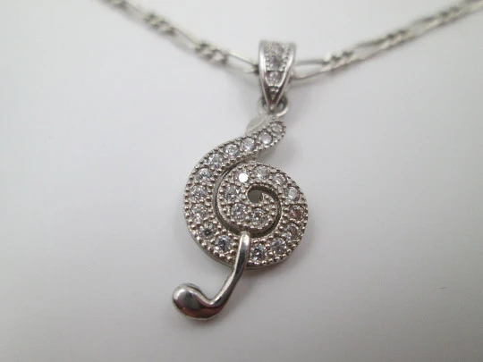 Chain with musical note pendant. 925 sterling silver and white gems. 1990's