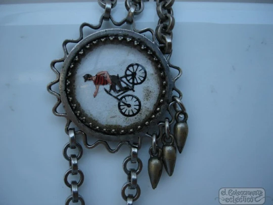 Chatelaine pocket watch. Nickel plated metal. Enamels. Cyclists