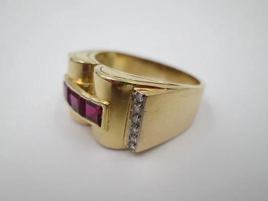 Chevalier women's ring. 18 karat yellow gold. Rubies and diamonds. 1930's