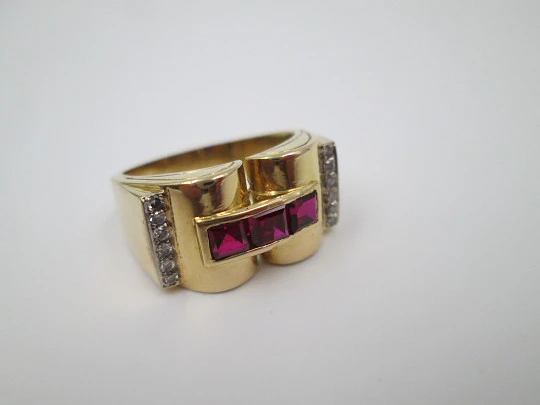 Chevalier women's ring. 18 karat yellow gold. Rubies and diamonds. 1930's