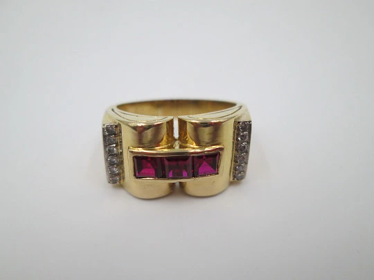 Chevalier women's ring. 18 karat yellow gold. Rubies and diamonds. 1930's