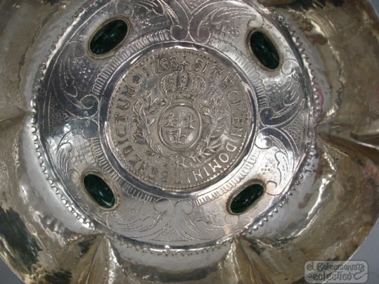 Chiselled silver plated centerpiece Green stones and shield. 1940's