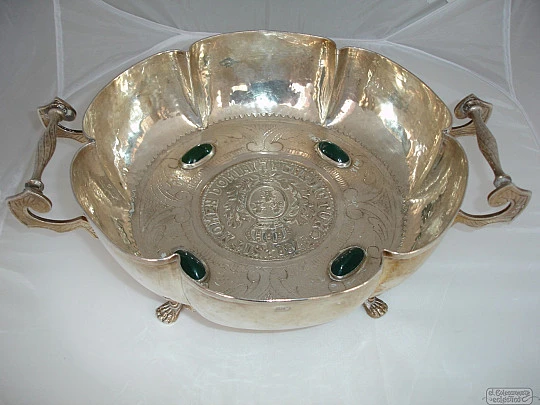 Chiselled silver plated centerpiece Green stones and shield. 1940's
