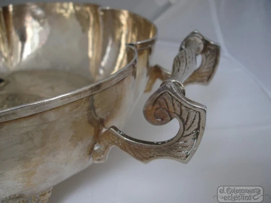 Chiselled silver plated centerpiece Green stones and shield. 1940's