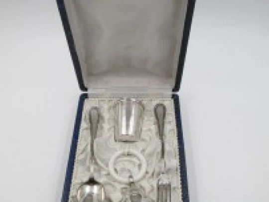 Christening set. Sterling silver. Rattle, glass and cutlery. 1980's. Spain