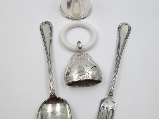 Christening set. Sterling silver. Rattle, glass and cutlery. 1980's. Spain