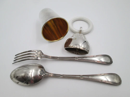 Christening set. Sterling silver. Rattle, glass and cutlery. 1980's. Spain