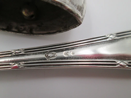 Christening set. Sterling silver. Rattle, glass and cutlery. 1980's. Spain