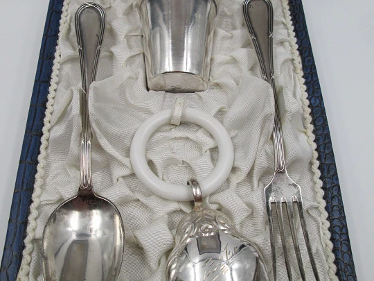 Christening set. Sterling silver. Rattle, glass and cutlery. 1980's. Spain