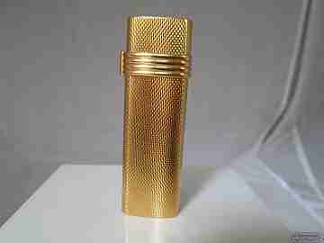 Christian Dior butane lighter. Guilloche. Gold plated. Swiss