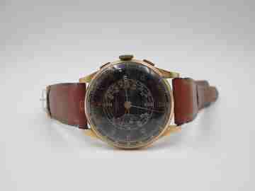 Chronographe Suisse. Black dial. 18 karat gold. Manual winding