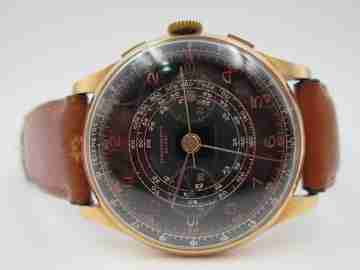 Chronographe Suisse. Black dial. 18 karat gold. Manual winding