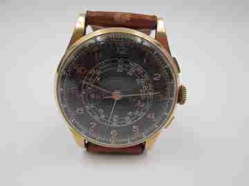 Chronographe Suisse. Black dial. 18 karat gold. Manual winding