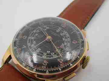 Chronographe Suisse. Black dial. 18 karat gold. Manual winding
