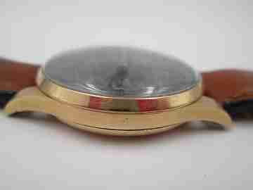 Chronographe Suisse. Esfera negra. Oro 18K. Cuerda. Años 60
