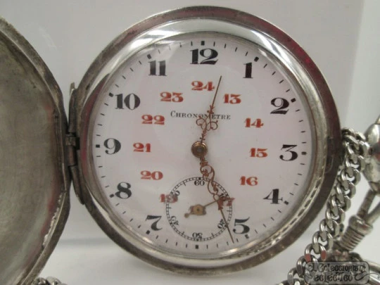 Chronometre. Hunter case. Niello silver. Stem-wind. 1910's. Chain