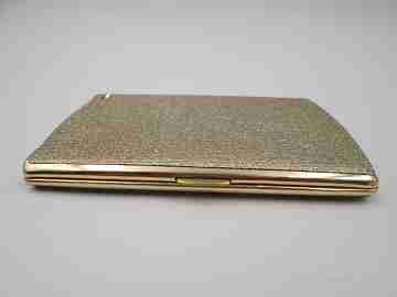 Cigarette case with petrol lighter. Gold plated metal. Grainy texture front. Box. 1960's