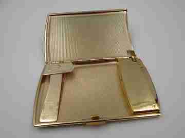 Cigarette case with petrol lighter. Gold plated metal. Grainy texture front. Box. 1960's