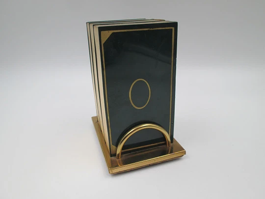 Cigarette dispenser book with stand. Lacquer brass. Three holders (30 pcs). Italy. 1950's