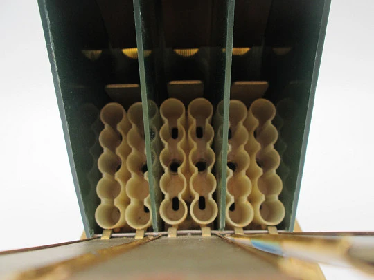 Cigarette dispenser book with stand. Lacquer brass. Three holders (30 pcs). Italy. 1950's