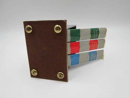 Cigarette dispenser book with stand. Lacquer brass. Three holders (30 pcs). Italy. 1950's