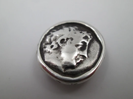 Circular pendant for ribbon. Sterling silver. Greek bust relief. Europe. 1930's
