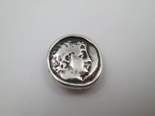 Circular pendant for ribbon. Sterling silver. Greek bust relief. Europe. 1930's